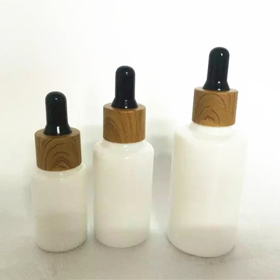 Custom Glass Cosmetic Serum Bottle 30ml 1oz Frosted Round Shoulder Dropper Bottle For Essential Oils