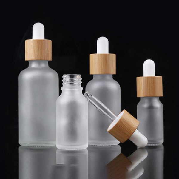 Custom Glass Cosmetic Serum Bottle 30ml 1oz Frosted Round Shoulder Dropper Bottle For Essential Oils